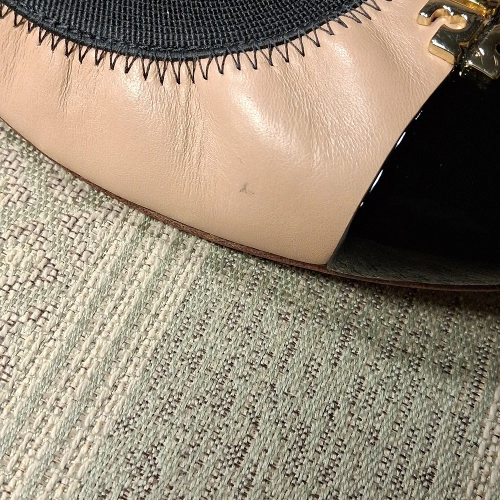 Tory Burch Nude Tan and Black Cap-Toe Leather Pumps